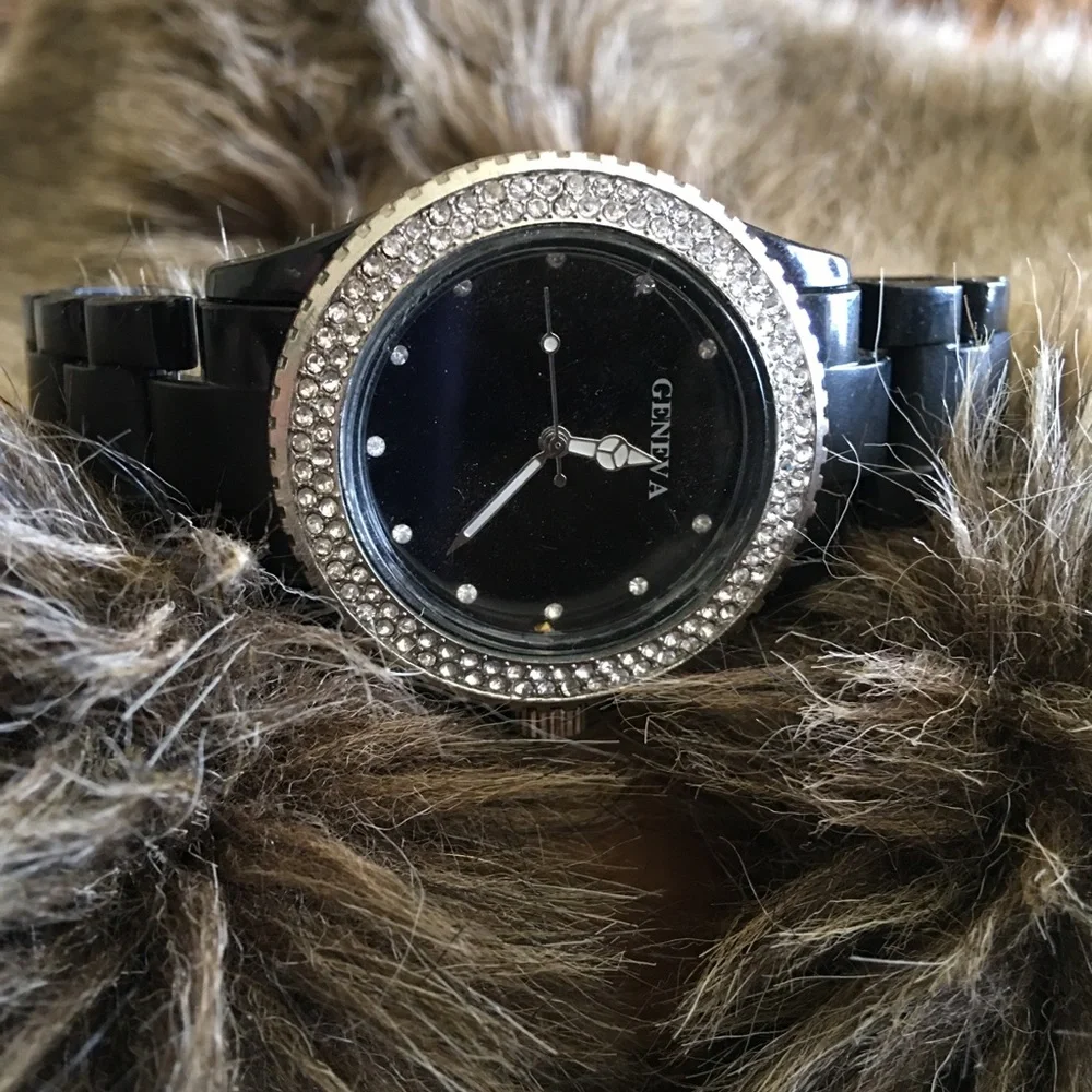 Ladies Geneva black plastic band rhinestone watch